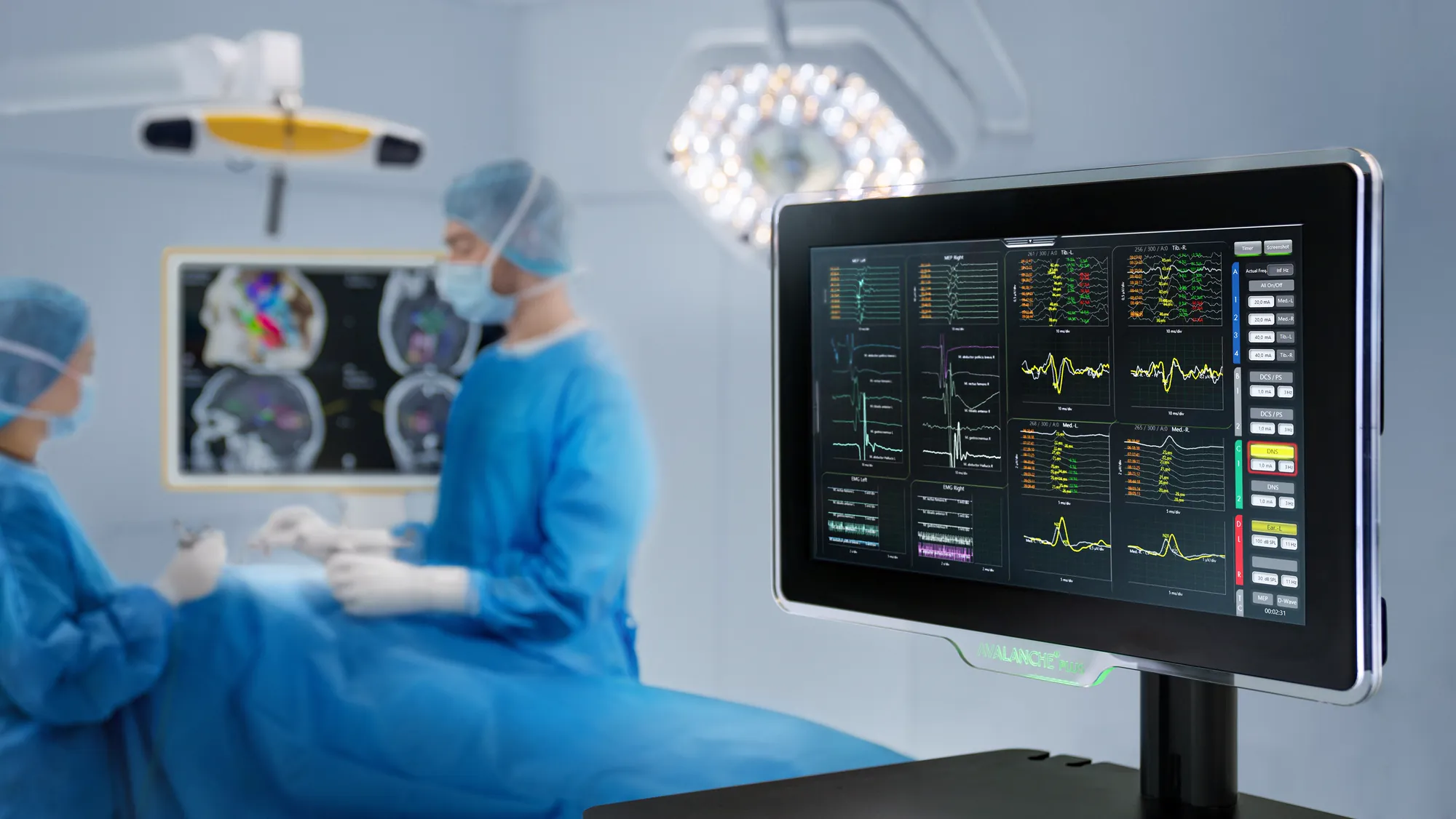 Intraoperative neuromonitoring console showing motor evoked potential, EMG and somatosensory evoked potential traces during surgery